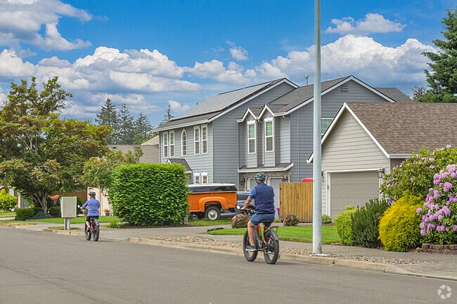Residents of Hazel Grove-Westling Farm enjoying riding bicycles throughout the neighborhood.