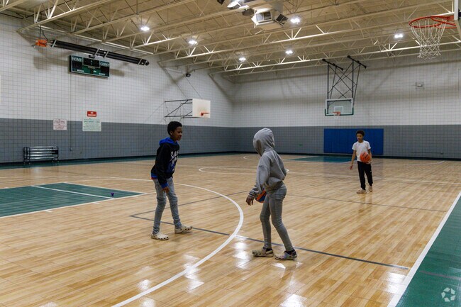 Hoops and laughter at Phillips Ave's Peeler Rec Center.