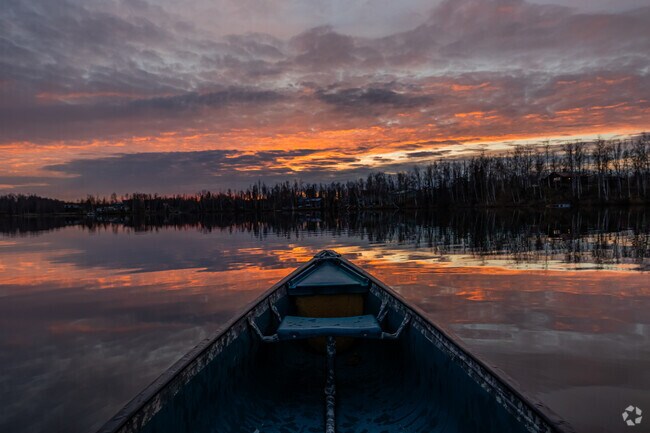 Enjoy a beautiful sunset in a canoe in Meadow Lakes.