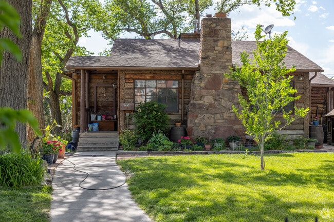 Rustic stonework sets off this cozy cottage in Broadway Central Corridor’s Huning Highlands.
