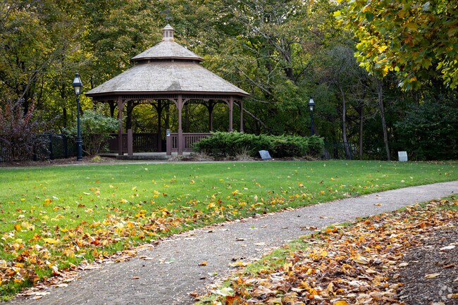 Under the Hope Village Green gazebo residents of Sciutate gather in the Historic District.