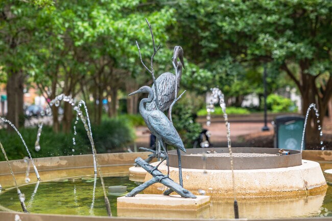Check out the beautiful wildlife art around the fountain at Marion Square in Charleston.