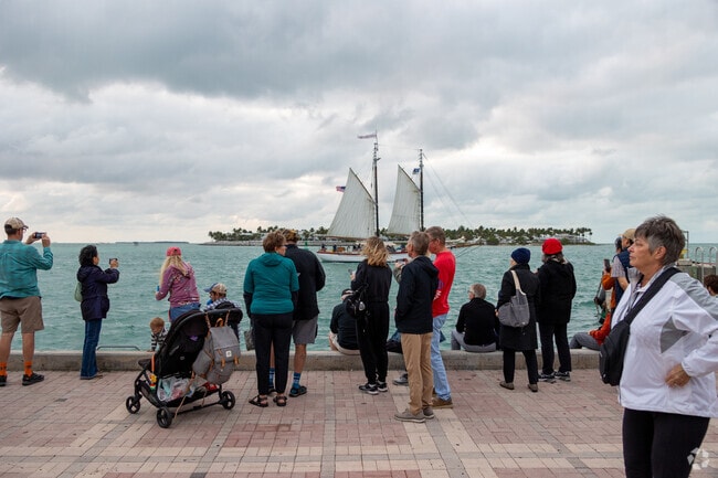 Tourists gathering to watch the sunset every night from the Malloy Square in Key West.