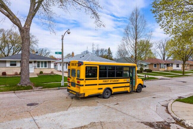 A school bus driving through the Euclid Park neighborhood.