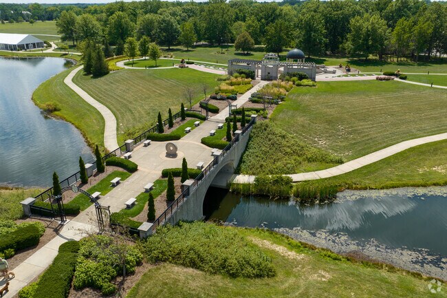 A bridge leads to Coxhall Gardens in West Carmel.
