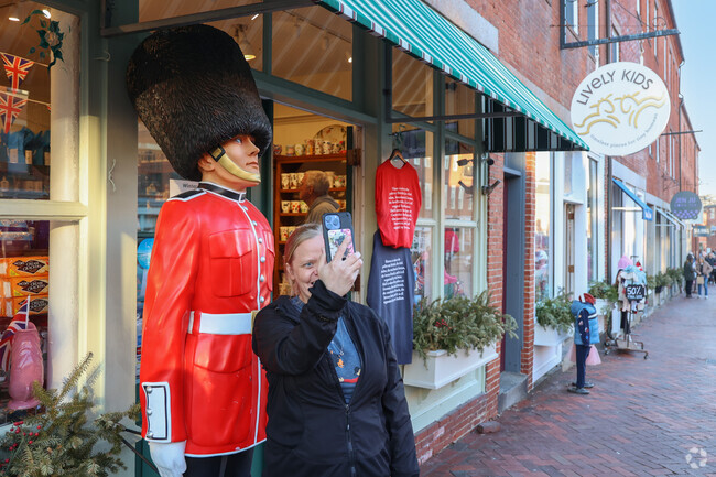 Take a selfie with the royal guard outside the British Store in South End.