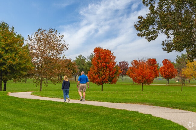 Get your steps in on the walking path and enjoy the foliage at Charles E. Memorial Park.