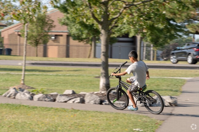 The paved paths at Cheektowaga Town Park near Central Cheektowaga for bike riders.