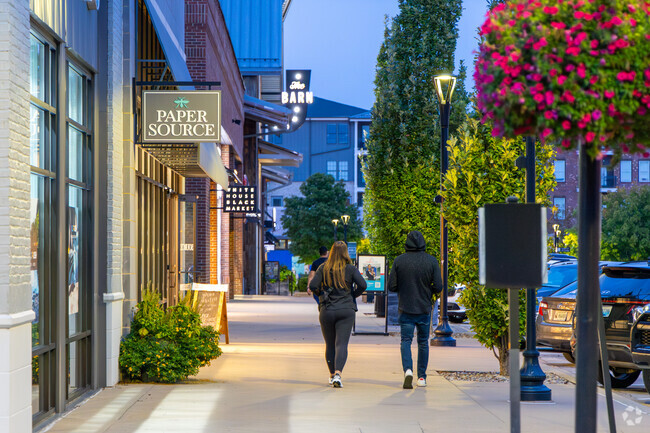 Greendale residents spend evenings browsing the luxury retailers at The Summit at Fritz Farm.