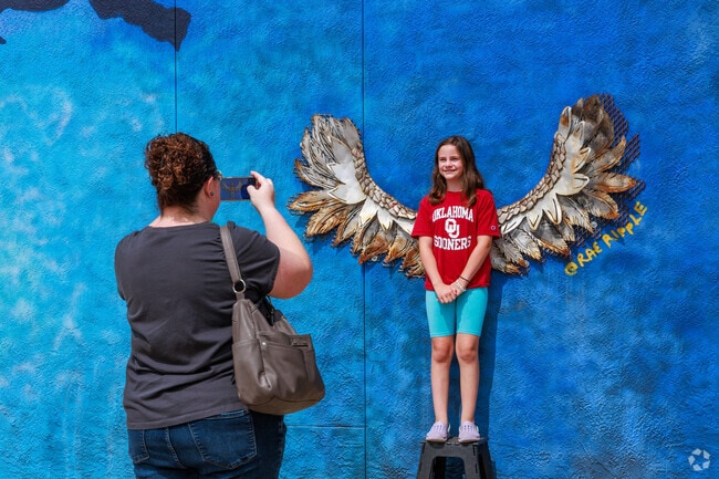 Pavilion Park families love exploring the vibrant murals that bring Downtown Midland to life.