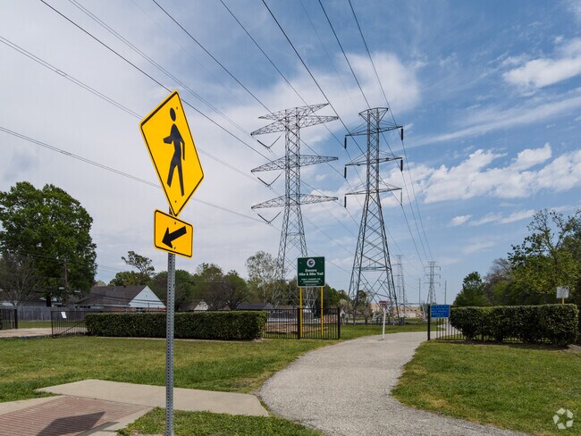 Residents like to take long walks on Emnora Lane Hike and Trail in Spring Shadows.