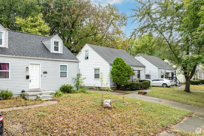 Cornell Heights homes sit along leafy streets shaded by large-bowed trees.