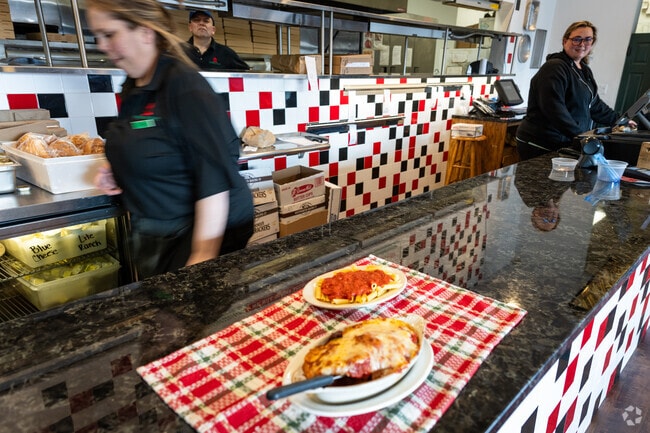 Indulging in a pasta and chicken parmesan popular dish at Uncle Tony's in Darlington, RI.