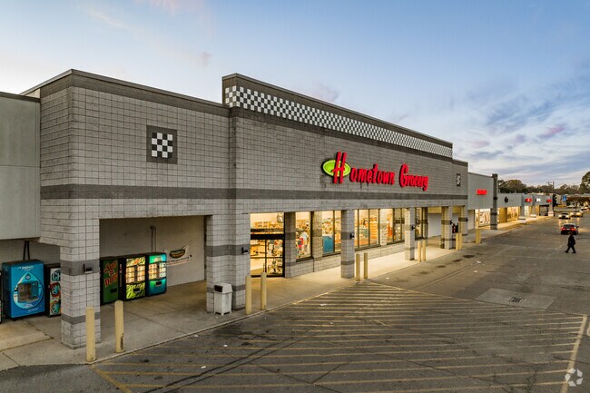 Residents of Cartwright do their grocery shopping at the Hometown Market in Athens.