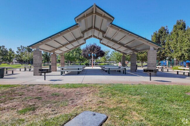 Locals relax in the afternoon at Bill Pinkerton Memorial Park in Plumas Lake.