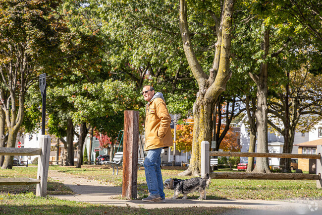 Take the dog for a walk on the path at Pulaski Park.