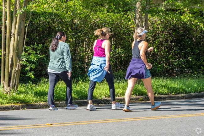 Residents often stroll Hillwood’s quiet, sidewalk-lined streets.