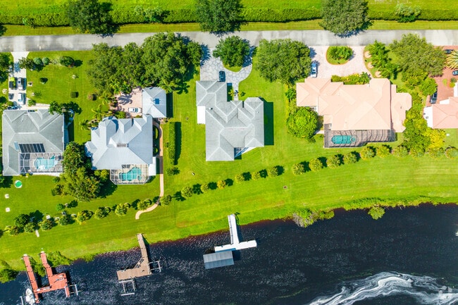 Many of the riverfront properties are on oversized lots with upscale homes.