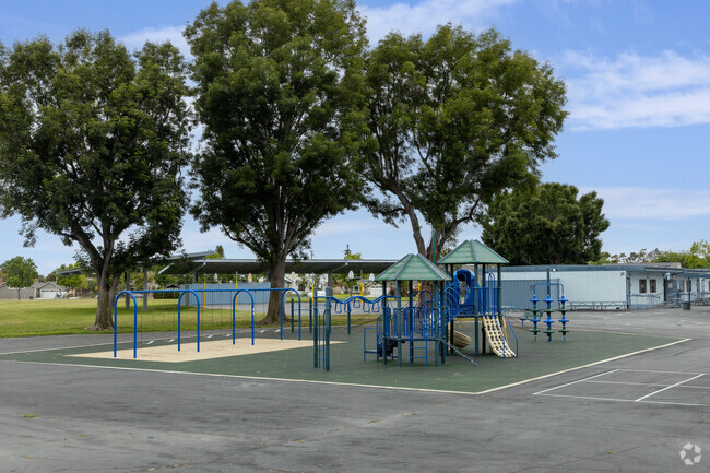 Children take a break on Rossmoor Elementary School playground in Rossmoor, CA.