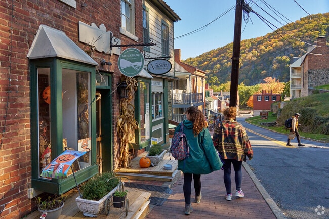Visitors to Harpers Ferry explore the charming town and its beautiful views.