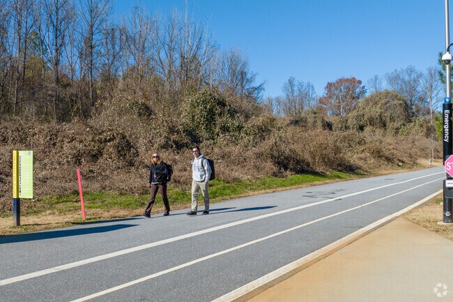 Residents take lengthy walks around Westside Park featuring paved paths and trails.