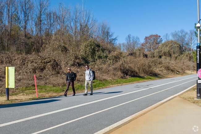 Residents take lengthy walks around Westside Park featuring paved paths and trails.
