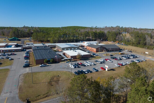 Ashville School system has the High, Middle and Elementary schools in the same location.