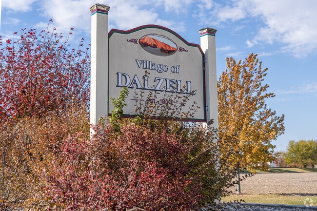 Welcome sign marking the entrance to the Village of Dalzell, established in 1903, a reminder of the community’s deep roots and enduring local pride.