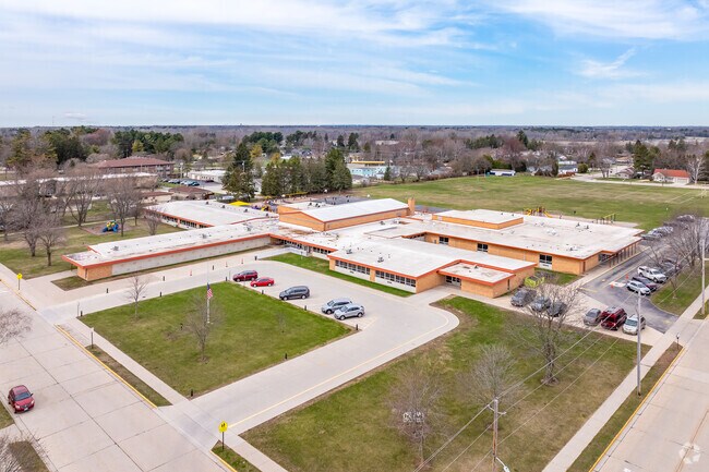 The Magee Elementary School scores a B- by Niche.