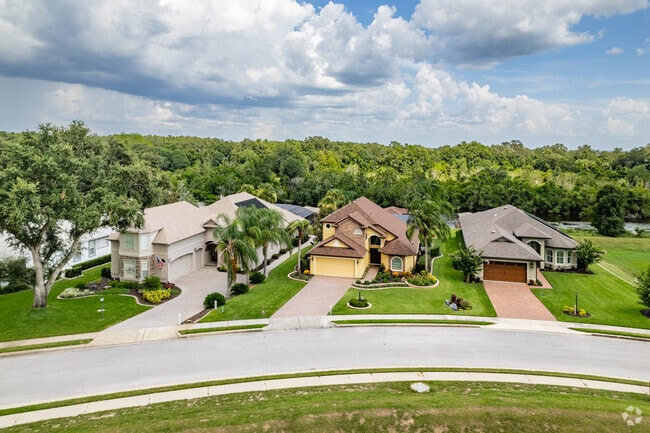 A row of colorful waterfront homes in Lady Lake's Harbor Hills Country Club.