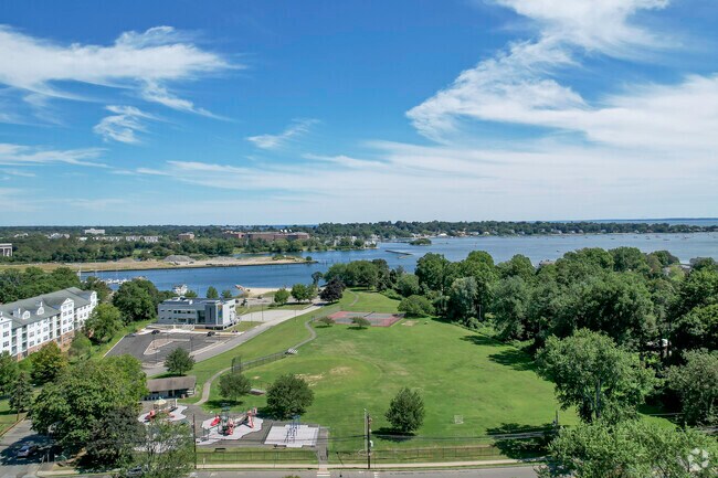 John J Boccuzzi Park has a playground, softball field, basketball & tennis courts, and a marina.
