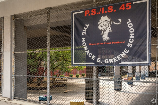 The schoolyard for PS/IS 45 Horace E Greene is fully enclosed for safety.