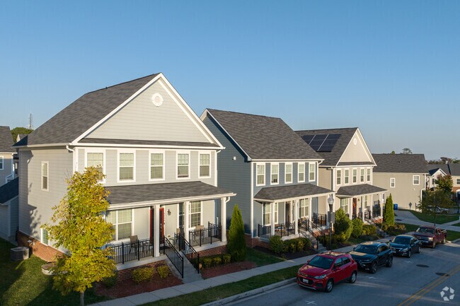 Homes with long porches are common in the Edmondson Village neighborhood.
