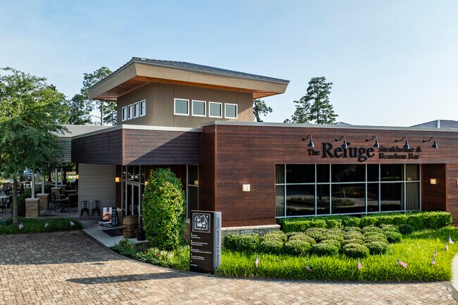 The Refuge is a popular steakhouse and bourbon bar located in Creekside Park.