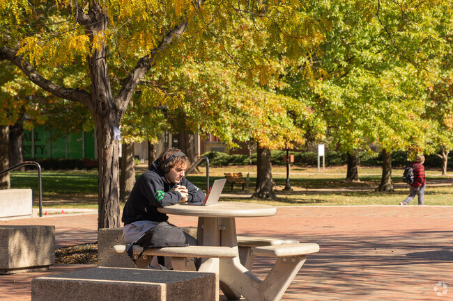 Students take advantage of nice weather and study outside in University District.