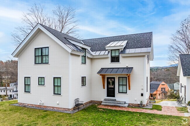 This Peterborough colonial was recently remodeled into a modern farmhouse style.