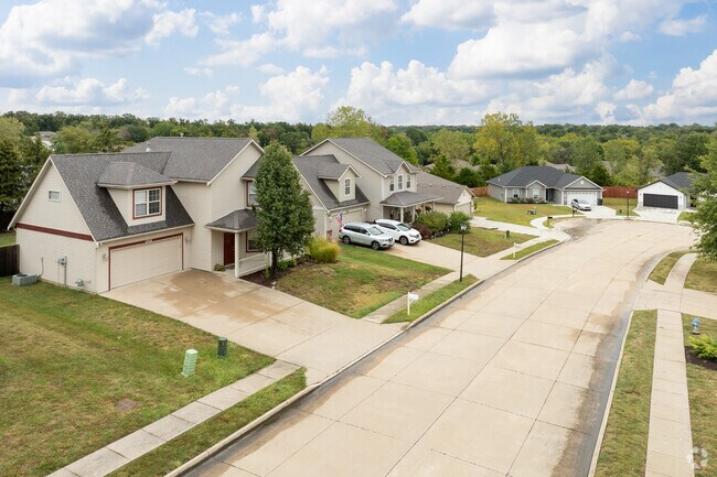Large traditional homes line the streets of Hominy Branch.