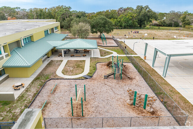Kids enjoy playing on the play area at Tarpon Springs Elementary.