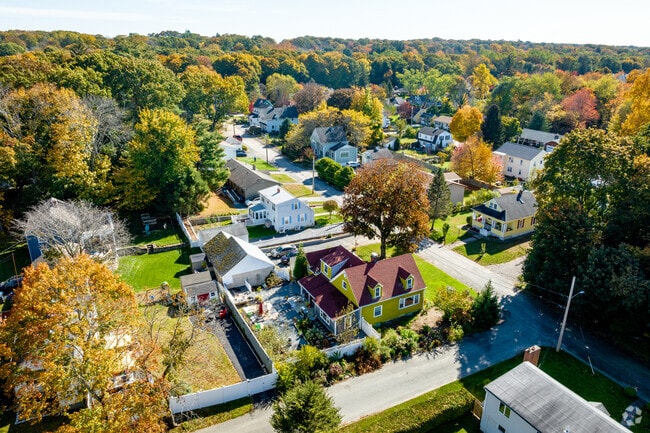 Meshanticut offers tree-lined streets and classic New England homes near the state park.