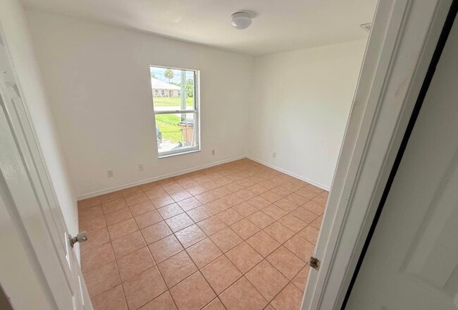 1031 Abrams Blvd unit One side duplex, Lehigh Acres, FL 33971 - photo 6