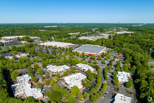 The commercial district of Matthews sits on it's eastern border.