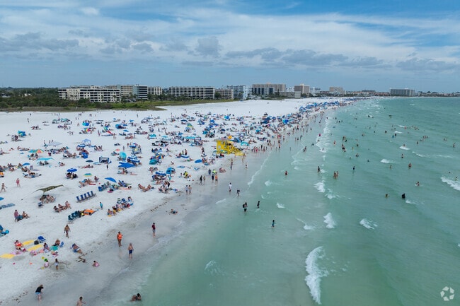 Siesta Beach is known for its cool-to-the-touch quartz sand and its renowned Sunday drum circle.