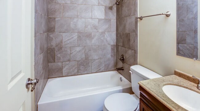 Bathroom with Marble Tile Surround