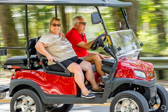 In Homosassa everything is smiles when riding in the golf cart around town.