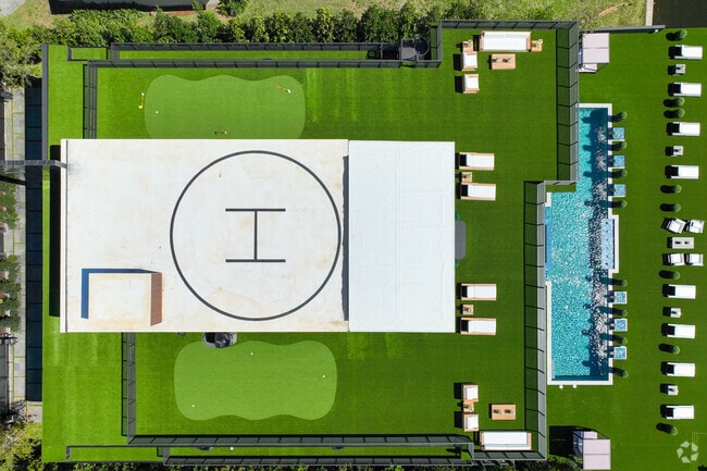 Helipad and golf area on top of a home in Sunrise Key.