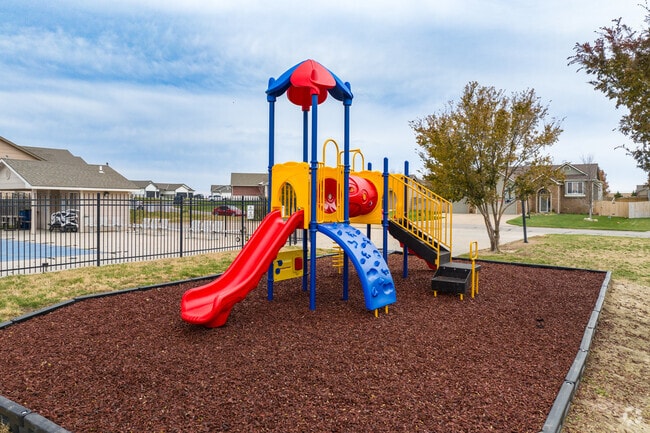 Kids can climb on the neighborhood playground in Southeast Wichita.