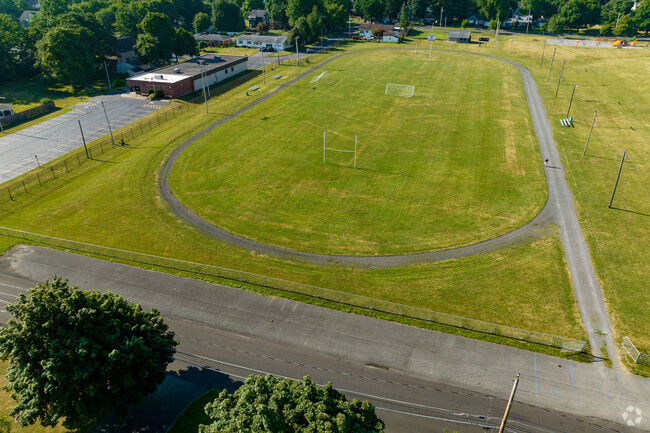 East Syracuse Elementary School has a well-liked sports field that is enjoyed by the students.