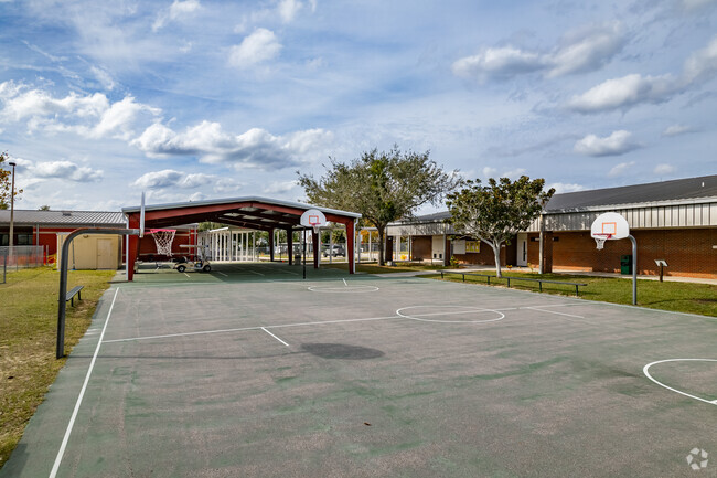Kids love to play hoops on the basketball court at  Cypress Ridge Elementary School in Clermont.