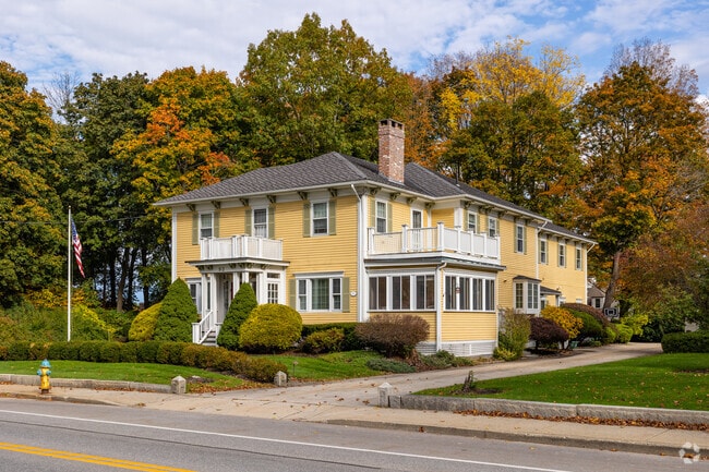 Add a pop of color to you North End Nashua, NH home with yellow wood siding.