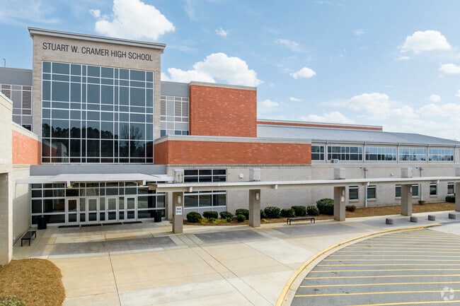 Main entrance of the Stuart W. Cramer High School campus.